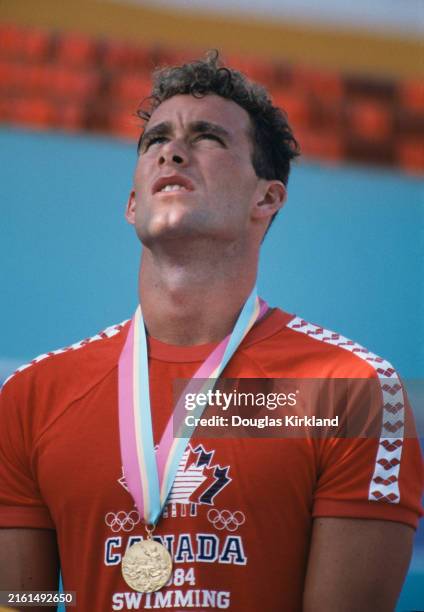 Canadian swimmer Victor Davis, Men's Swimming 200 metre breaststroke medal ceremony, McDonald's Olympic Swim Stadium, at the 1984 Summer Olympics,...