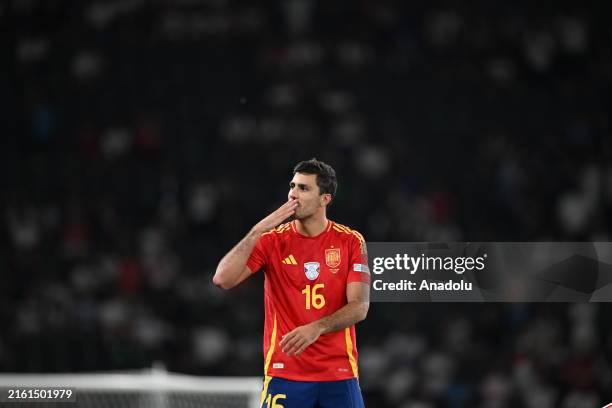 Rodri wins Player of the Tournament celebrates championship after winning the UEFA EURO 2024 final match between Spain and England at Olympiastadion...