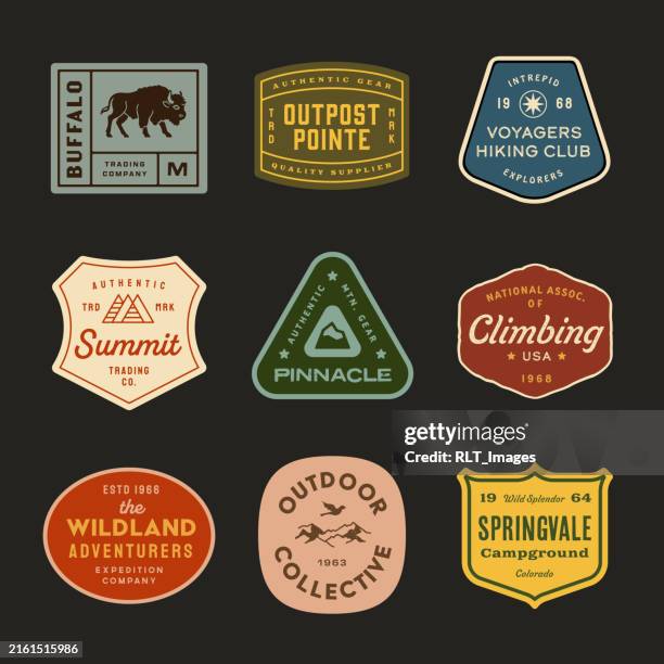 mid-century retro adventure badge designs - textile patch stock illustrations