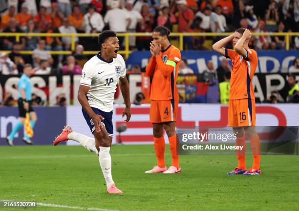 Ollie Watkins of England celebrates scoring his team's second goal during the UEFA EURO 2024 semi-final match between Netherlands and England at...
