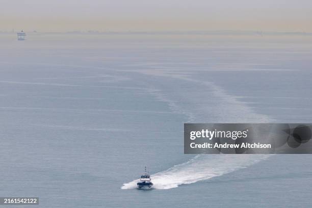Asylum seekers arriving into Western Jet Foil at Dover docks on board BF Volunteer, a Border Force boat after being rescued in the English Channel...