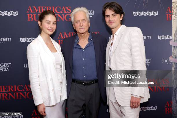 Michael Douglas and his children Carys Zeta Douglas and Dylan Michael Douglas attend an "America's Burning" New York screening at DGA Theater on July...