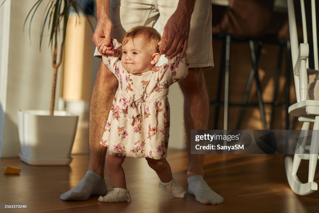 Simple First Steps First Steps Of My Baby High-Res Stock Photo - Getty Images