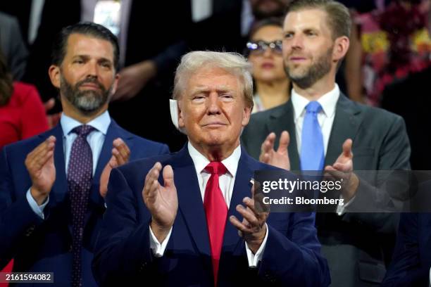 Former US President Donald Trump, center, during the Republican National Convention at the Fiserv Forum in Milwaukee, Wisconsin, US, on Monday, July...