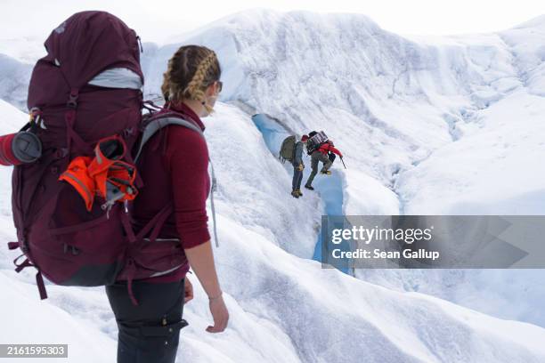 Petra Klimova , a researcher in glacial microbiology at Cryoeco, The Cryosphere Ecology Group at Charles University in Prague, Jakub Zarsky , a...