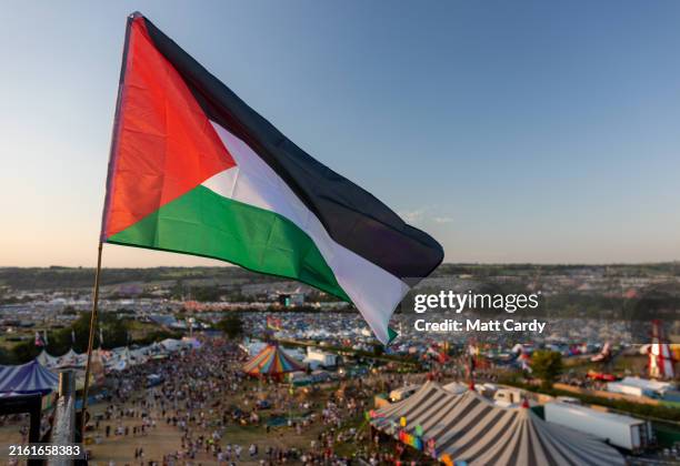 Palestinian flag is displayed during day one of Glastonbury Festival 2024 at Worthy Farm, Pilton on June 26, 2024 in Glastonbury, England. Founded by...