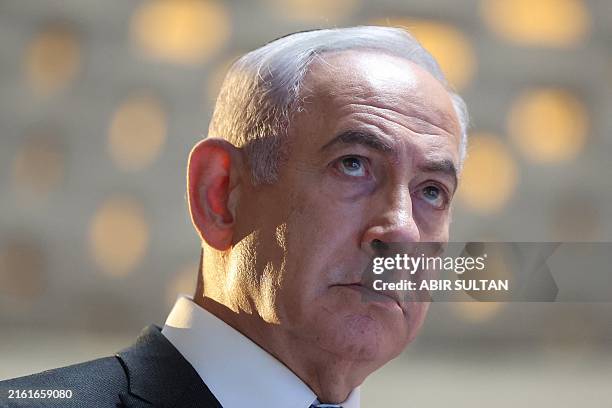 Israeli Prime Minister Benjamin Netanyahu speaks during a commemoration ceremony for soldiers killed during the 2014 Gaza war, also known as...