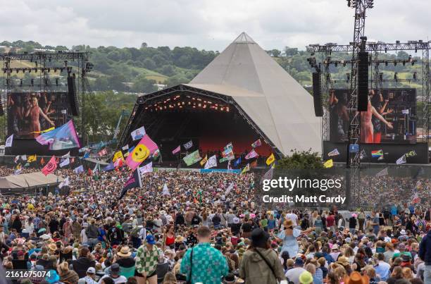 People gather in front of the main Pyramid Stage during day five of Glastonbury Festival 2024 at Worthy Farm, Pilton on June 30, 2024 in Glastonbury,...