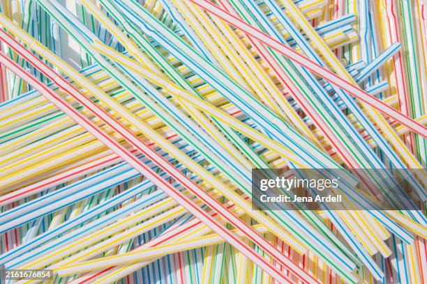 drinking straws, straw ban concept, plastic and microplastics - paja fotografías e imágenes de stock