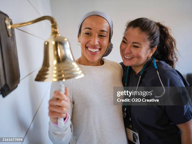 Cancer Bell Ringer 98 Cancer Patient Ringing Bell Stock Photos, High-Res Pictures, and ...