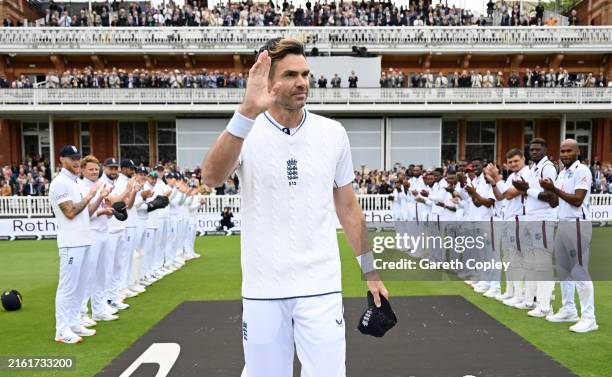 James Anderson of England walks through the guard of honour on his final test appearance ahead of day three of 1st Test Match between England and the...