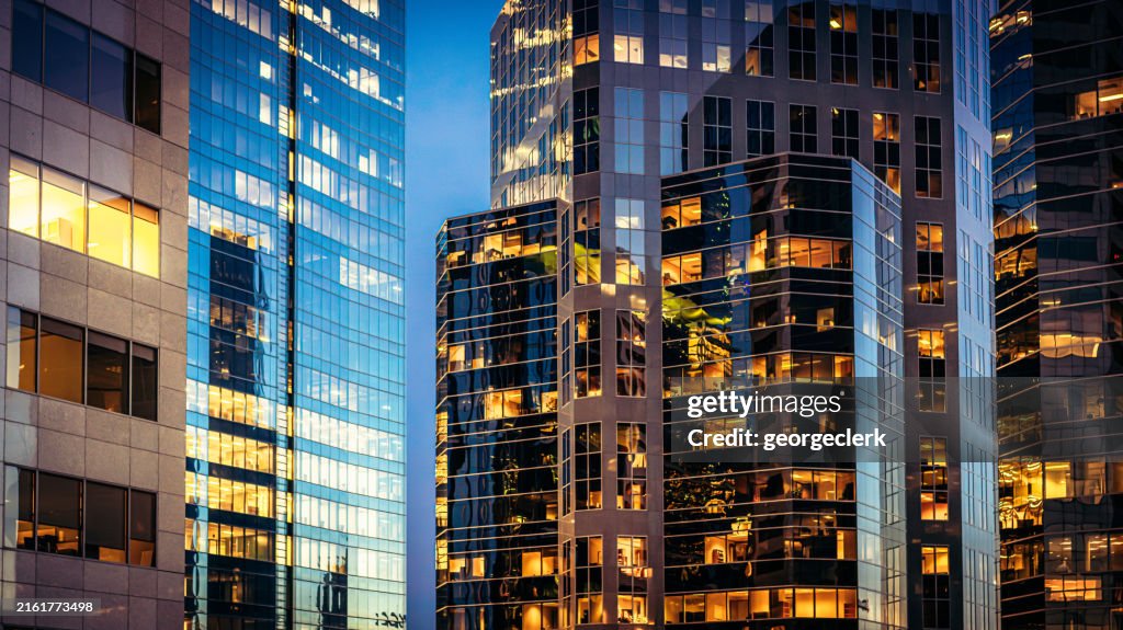 Modern glass offices at dusk