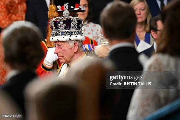 Britain's King Charles III wearing the Imperial State Crown attends the State Opening of Parliament, at the Houses of Parliament, in London, on July...