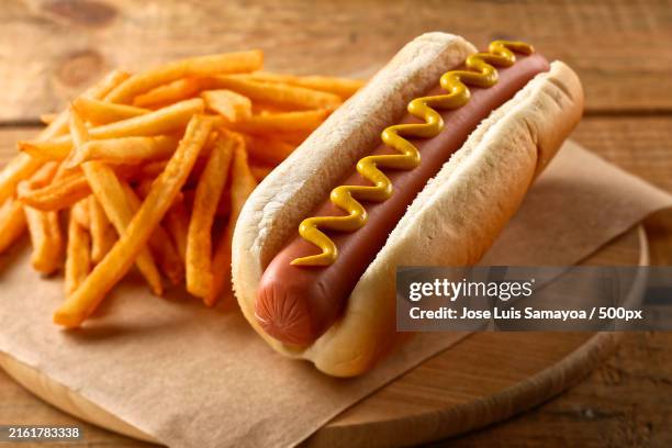 close-up of sandwich and french fries on table - processed meat stock pictures, royalty-free photos & images