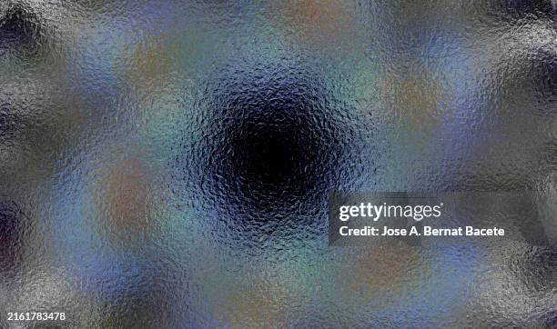 bright silver metallic sheet with circular reflections. - mercurio fotografías e imágenes de stock