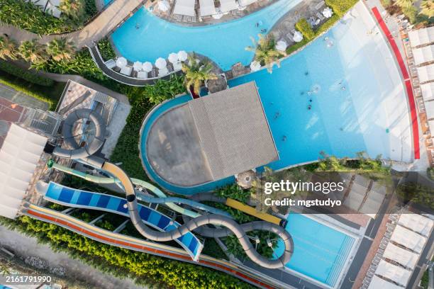 aerial view of luxury resort hotel swimming pool - water park stock pictures, royalty-free photos & images