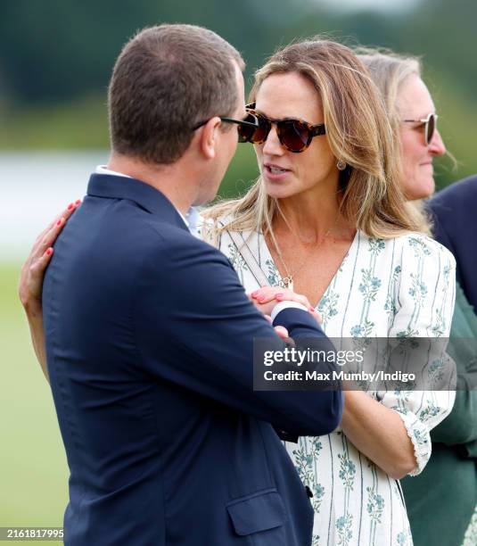 Peter Phillips and Harriet Sperling attend the Out-Sourcing Inc. Royal Charity Polo Cup 2024 at The Castle Ground, Guards Polo Club, Flemish Farm on...