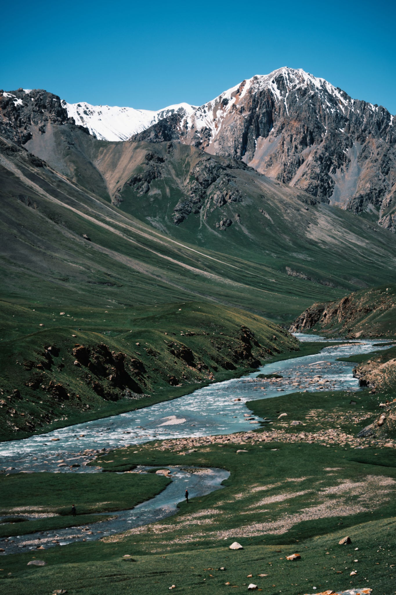 Majestic view of green mountains above picturesque river valley Majestic view of green mountains above picturesque river valley