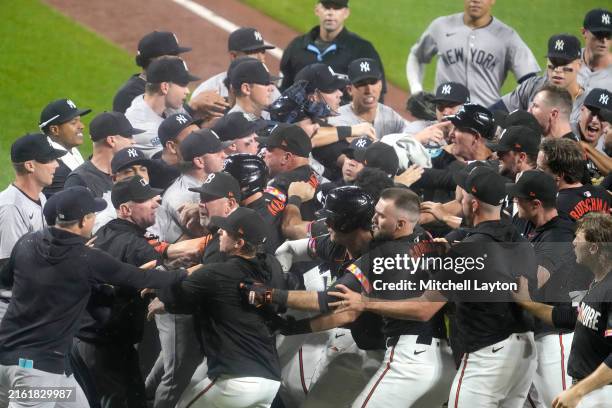 Benches clear after Heston Kjerstad of the Baltimore Orioles is hit by pitch in the ninth inn during a baseball game against the New York Yankees at...
