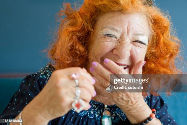 the hearty laugh of the elegant old lady. - ginger zest stock pictures, royalty-free photos & images