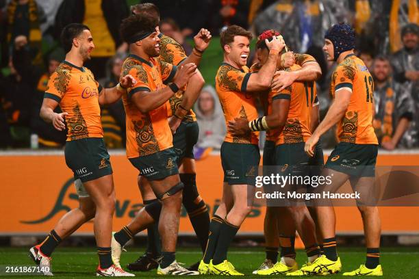 Filipo Daugunu of the Wallabies celebrates with team mates after scoring a try during the International Test Match between Australia Wallabies and...