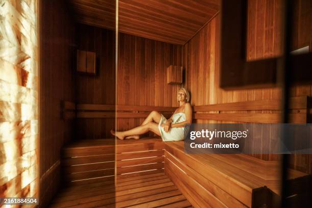 waiting for the steam to work it's magic - sauna stockfoto's en -beelden