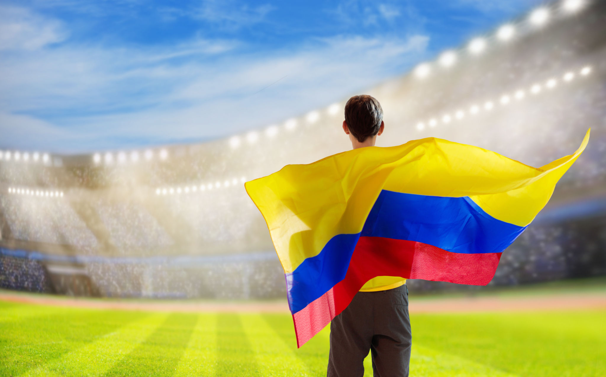 Colombia football team supporter on stadium. Colombia football team supporter on stadium.