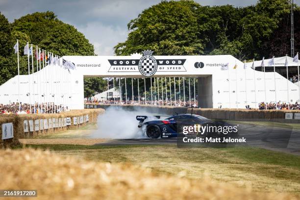 Mad Mike' Whiddett is seen drifting a Lazante MadMac McLaren on the Hillclimb during the Goodwood Festival Of Speed 2024 at Goodwood on July 13, 2024...