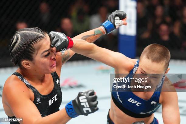 Rose Namajunas punches Tracy Cortez in a flyweight fight during the UFC Fight Night event at Ball Arena on July 13, 2024 in Denver, Colorado.