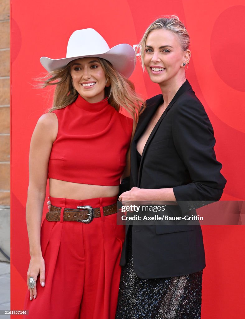 Bnnnd Lainey Wilson and Charlize Theron attend the Charlize Theron Africa ...