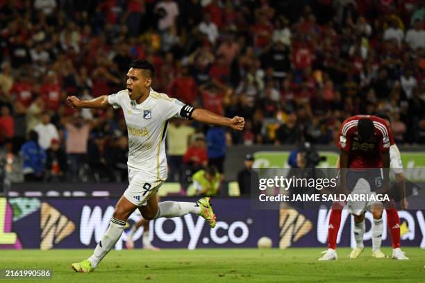 Millonarios' forward Radamel Falcao celebrates his team's first goal scored by Millonarios' Argentine forward Santiago Giordana during the Liga...