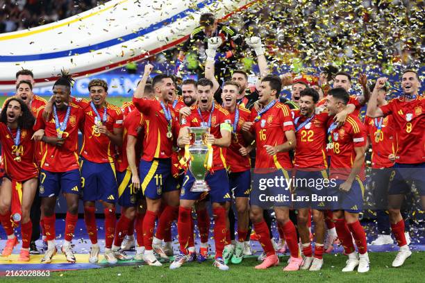 Alvaro Morata of Spain lifts the UEFA Euro 2024 Henri Delaunay Trophy after his team's victory during the UEFA EURO 2024 final match between Spain...
