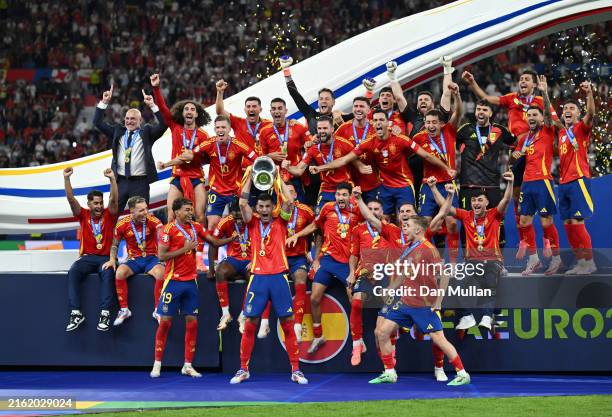 Alvaro Morata of Spain lifts the UEFA Euro 2024 Henri Delaunay Trophy after his team's victory during the UEFA EURO 2024 final match between Spain...