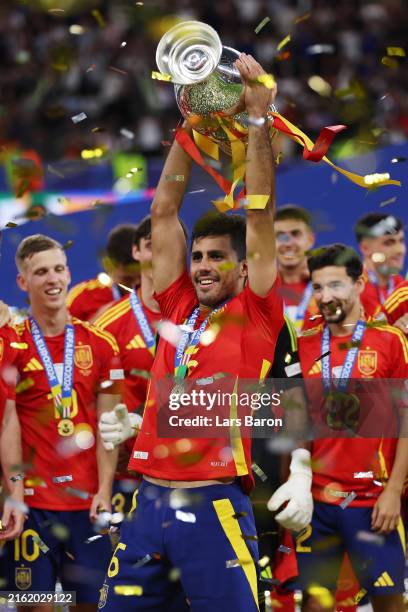 Rodri of Spain celebrates with the UEFA Euro 2024 Henri Delaunay Trophy after his team's victory in the UEFA EURO 2024 final match between Spain and...