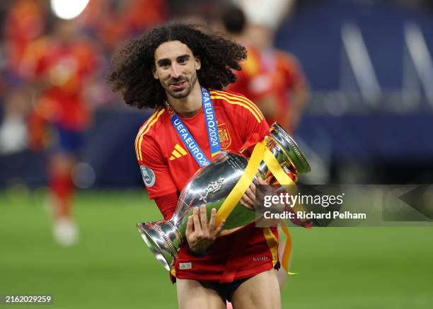 Marc Cucurella of Spain celebrates with the UEFA Euro 2024 Henri Delaunay Trophy after his team's victory during the UEFA EURO 2024 final match...
