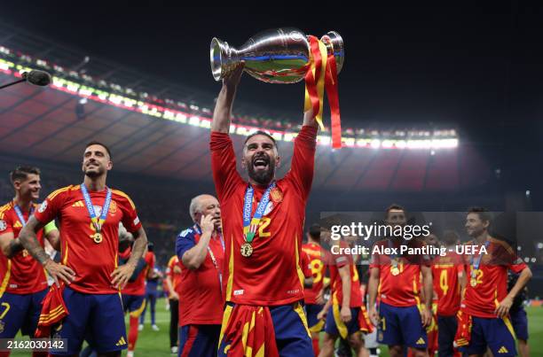 Daniel Carvajal of Spain celebrates with the UEFA Euro 2024 Henri Delaunay Trophy after his team's victory during the UEFA EURO 2024 final match...