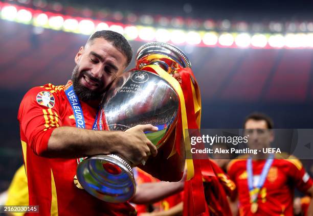Daniel Carvajal of Spain celebrates with the UEFA Euro 2024 Henri Delaunay Trophy after his team's victory during the UEFA EURO 2024 final match...