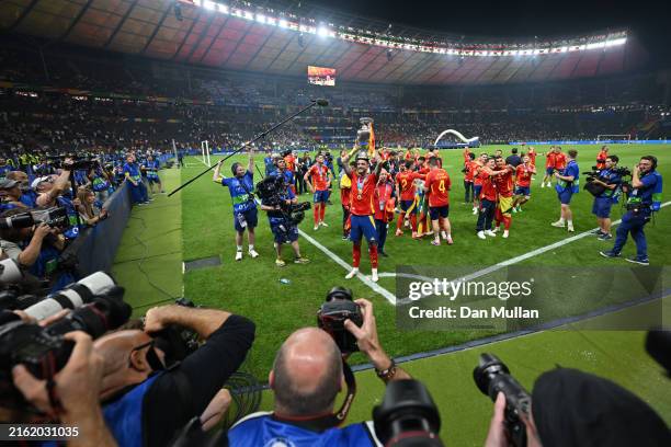General view as Joselu of Spain celebrates with the UEFA Euro 2024 Henri Delaunay Trophy after his team's victory during the UEFA EURO 2024 final...