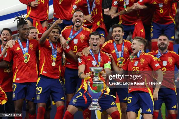 Alvaro Morata of Spain lifts the UEFA Euro 2024 Henri Delaunay Trophy after his team's victory during the UEFA EURO 2024 final match between Spain...