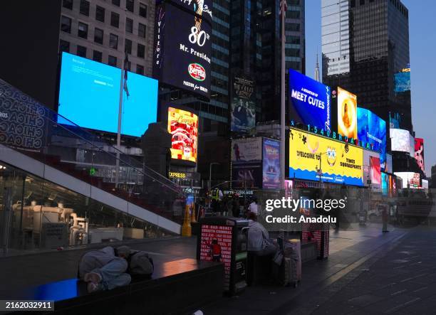 Digital boards are seen due to the global communications outage caused by CrowdStrike, which provides cyber security services to US technology...