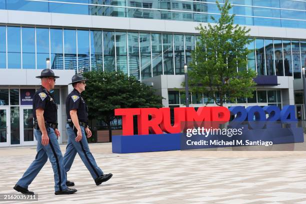 Law Enforcement Officers from Indiana walk along the Fiserv Forum Plaza ahead of the 2024 Republican National Convention on July 14, 2024 in...