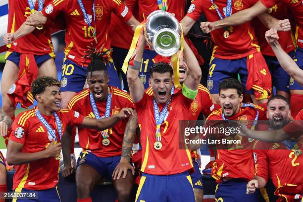 Alvaro Morata of Spain lifts the UEFA Euro 2024 Henri Delaunay Trophy after his team's victory during the UEFA EURO 2024 final match between Spain...
