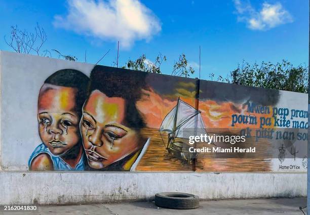 Mural in the northern port city of Cap-Haïtien warns Haitians about the perils of illegal migration.