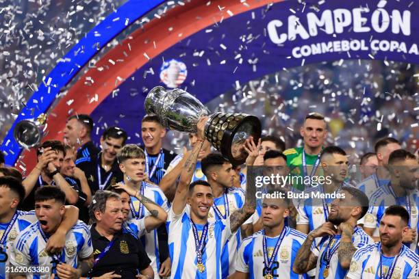Angel Di Maria of Argentina celebrates with the trophy after the team's victory in the CONMEBOL Copa America 2024 Final match between Argentina and...