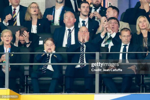 Prince George of Wales and Prince William, Prince of Wales react, right UEFA President Aleksander Ceferin during the UEFA EURO 2024 final match...