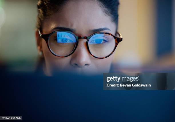 face, woman and university student on computer with focus for research, study and information for assignment. female person, education and college with revision for exams, test and assessment. - bril stockfoto's en -beelden