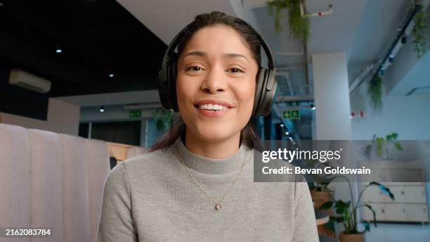 business, woman and portrait on video conference with communication for virtual seminar or online call in office. networking, employee and face with headphones for webinar, digital chat and meeting - face consultation stock pictures, royalty-free photos & images