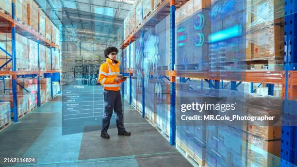 a male employee uses ai technology to analyze the logistics system - augmented reality stock pictures, royalty-free photos & images