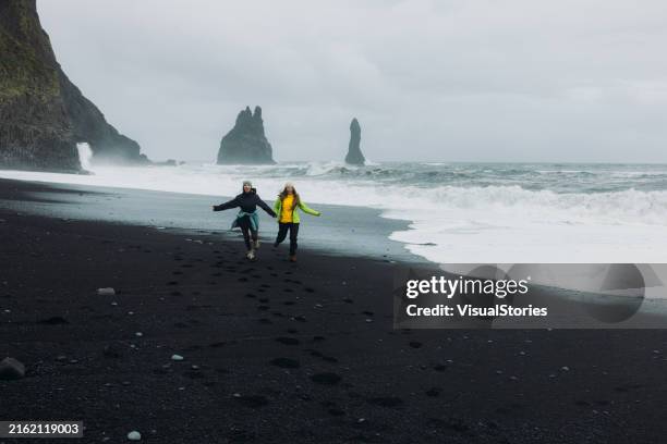 when in iceland - black sand stock pictures, royalty-free photos & images