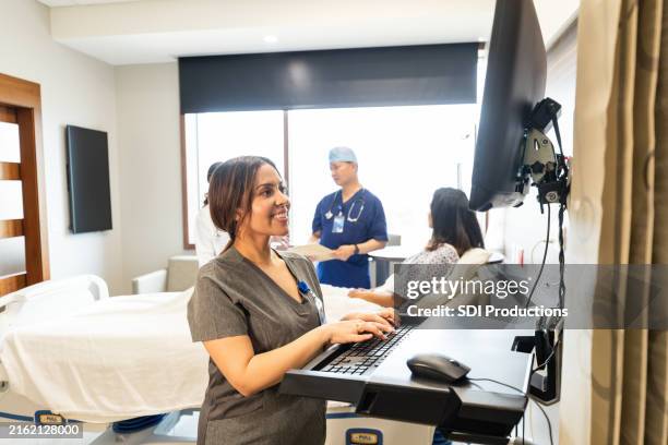 Nurse Ringing Computer 739 Nurse Typing At Computer Stock Photos, High-Res Pictures, and ...